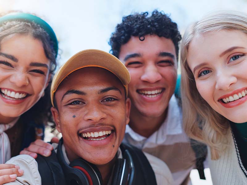 Friends smiling for a group photo