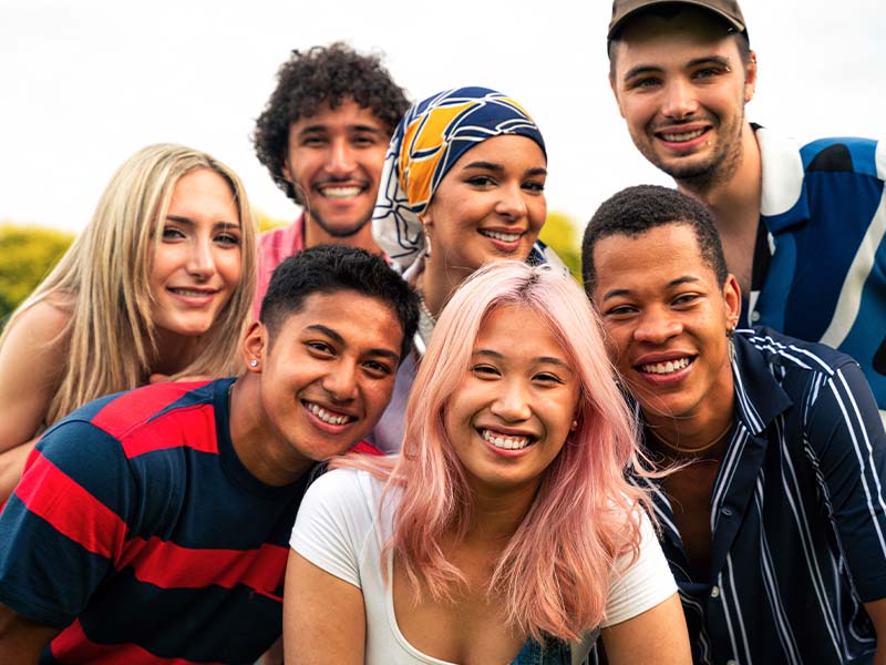 Diverse group of teenagers smiling