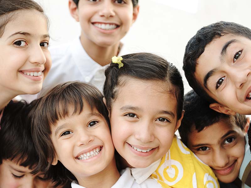 Group of children smiling together